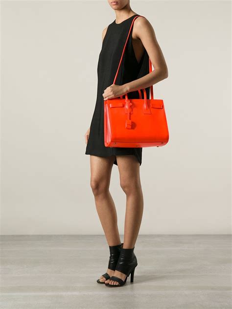 ysl sac de jour orange|ysl sac de jour medium.